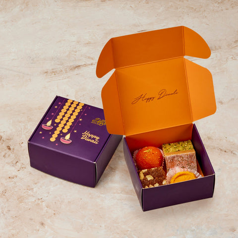 Extra Small Best Seller Diwali Box open beside its closed purple Happy Diwali gift box