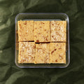 Almond Burfi in a clear box