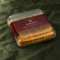 Besan Burfi in a clear box
