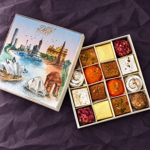 Pure Desi Bring India Home sweet box open beside its watercolour lid of Sydney Harbour and Delhi landmarks