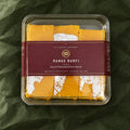 Mango Burfi in a clear box