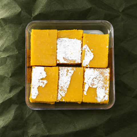 Mango Burfi in a clear box