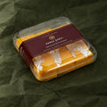 Mango Burfi in a clear box