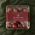 Mini Gulab Jamun in a clear box