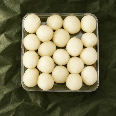 Mini Rasgulla in a clear box