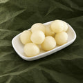 Mini Rasgulla on a plate