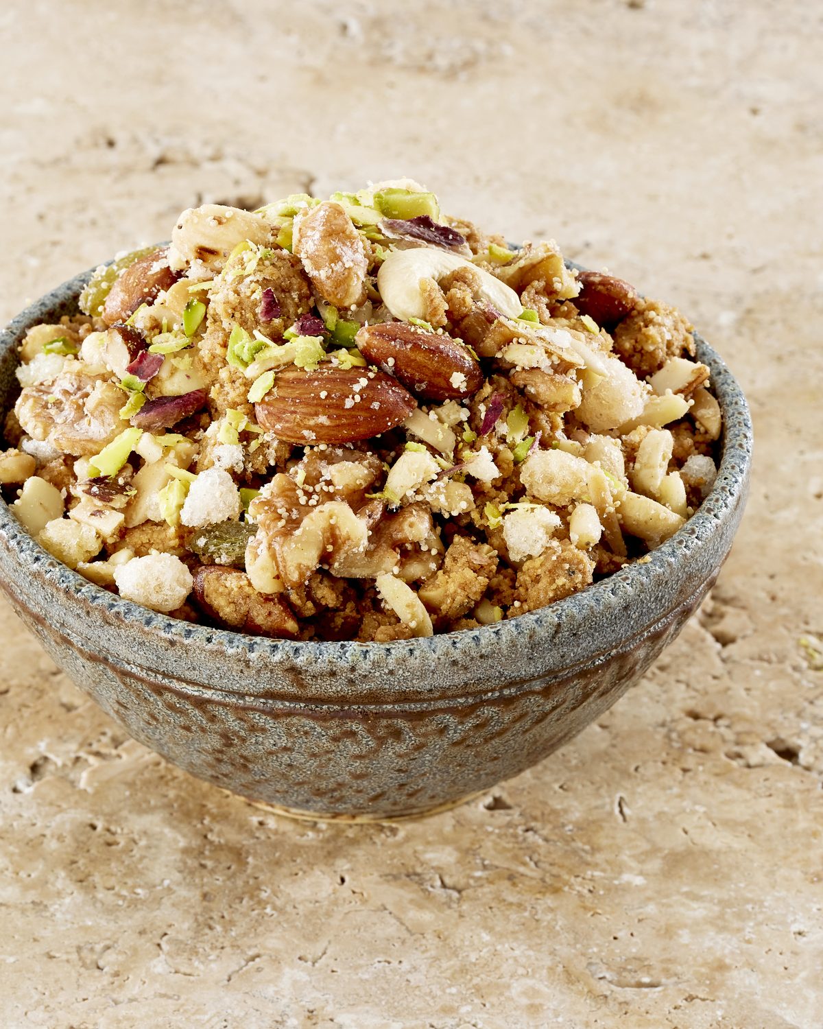 A bowl of panjiri with nuts and dry fruit