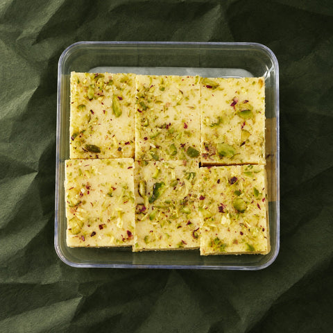 Pista Burfi in a clear box