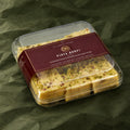 Pista Burfi in a clear box
