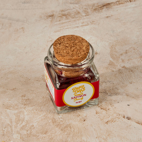 Corked glass jar of Pure Desi authentic saffron threads, 1g net