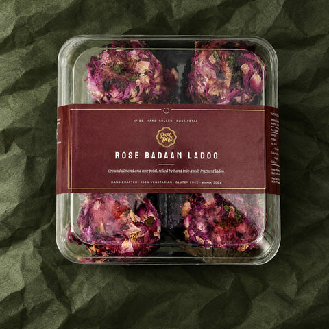 Rose Badaam Ladoo in a clear box