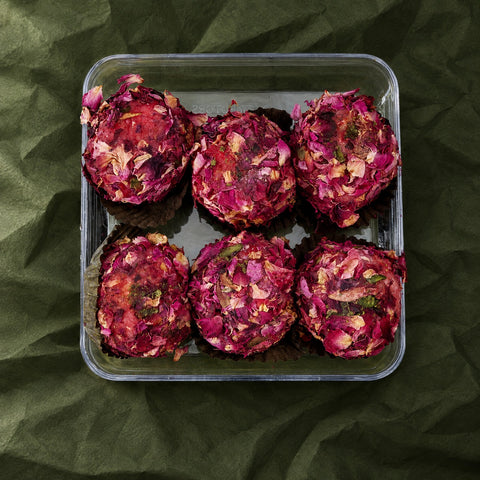Rose Badaam Ladoo in a clear box