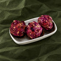Rose Badaam Ladoo on a plate